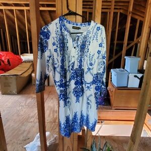 Tunic with floral accent